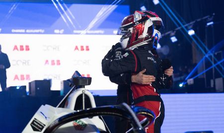 Wehrlein hugs Dennis at the Diriyah podium